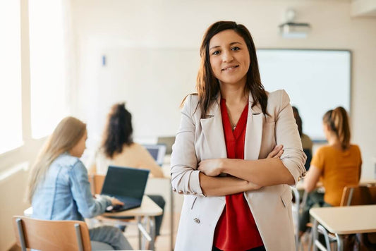 teacher standing in front of whiteboard